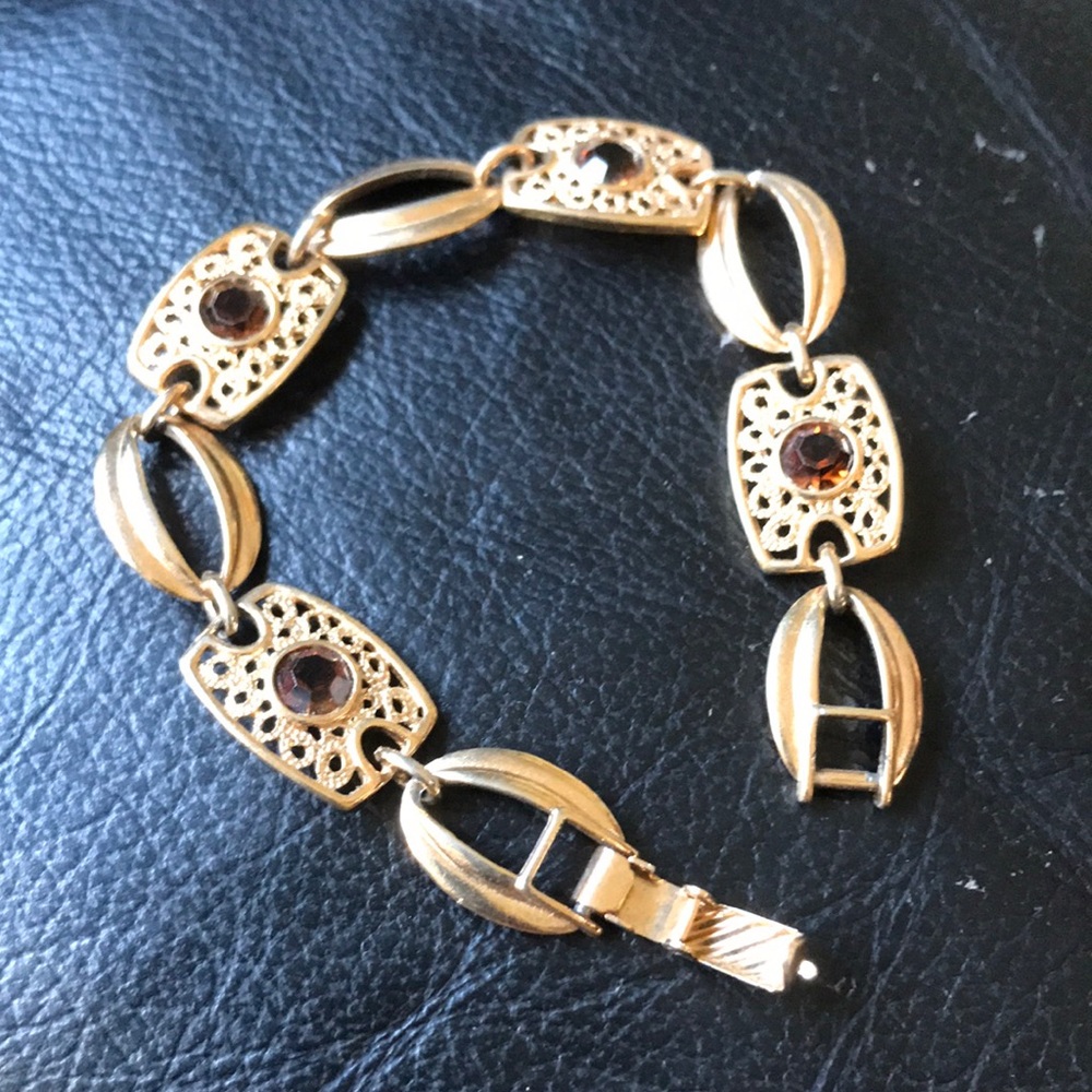 Costume bracelet with citrine stone.